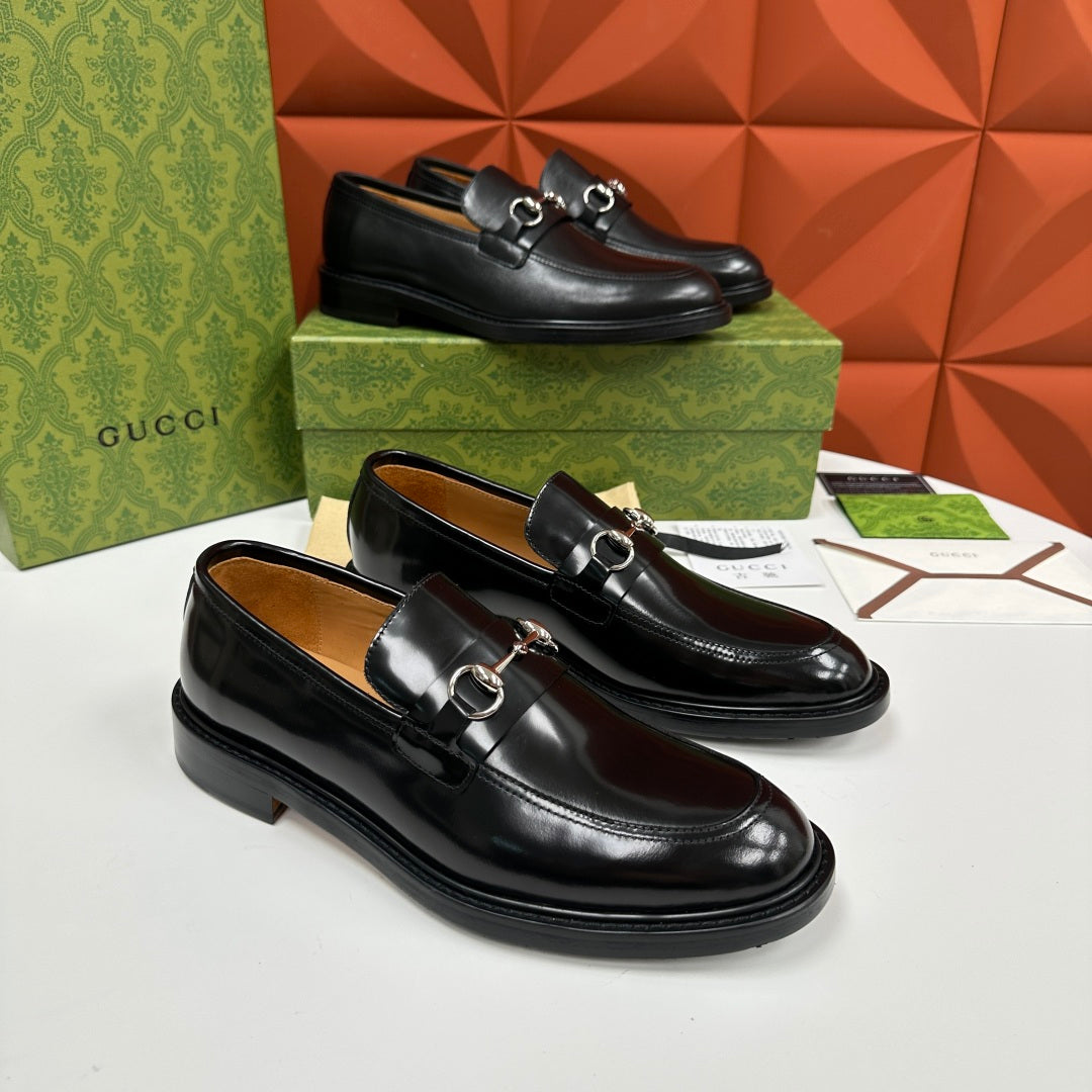 Gucci leather loafers, black with silver horsebit buckle, two pairs