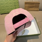 Gucci pink cap with GG monogram and adjustable strap on the side