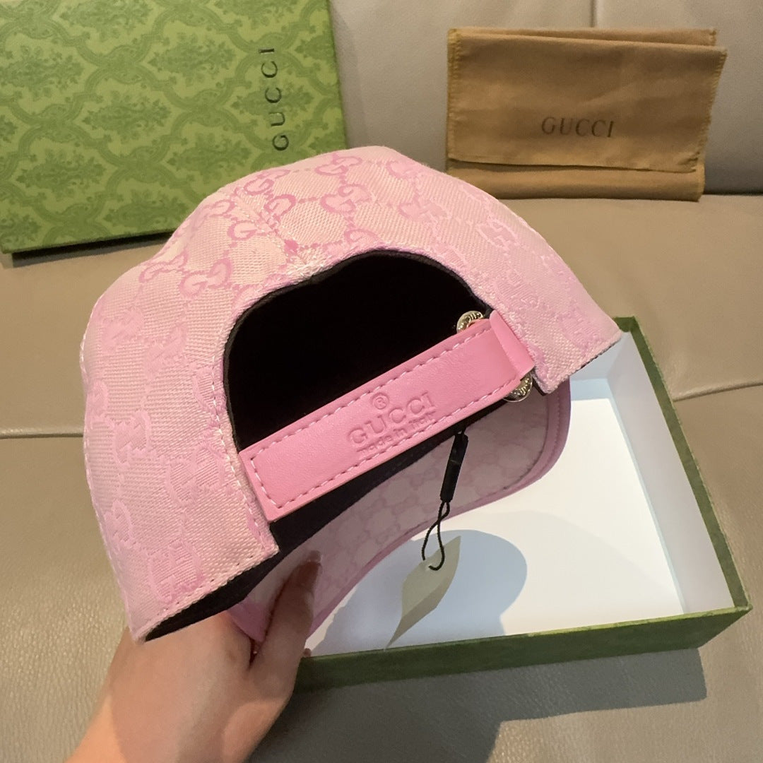 Gucci pink cap with GG monogram and adjustable strap on the side