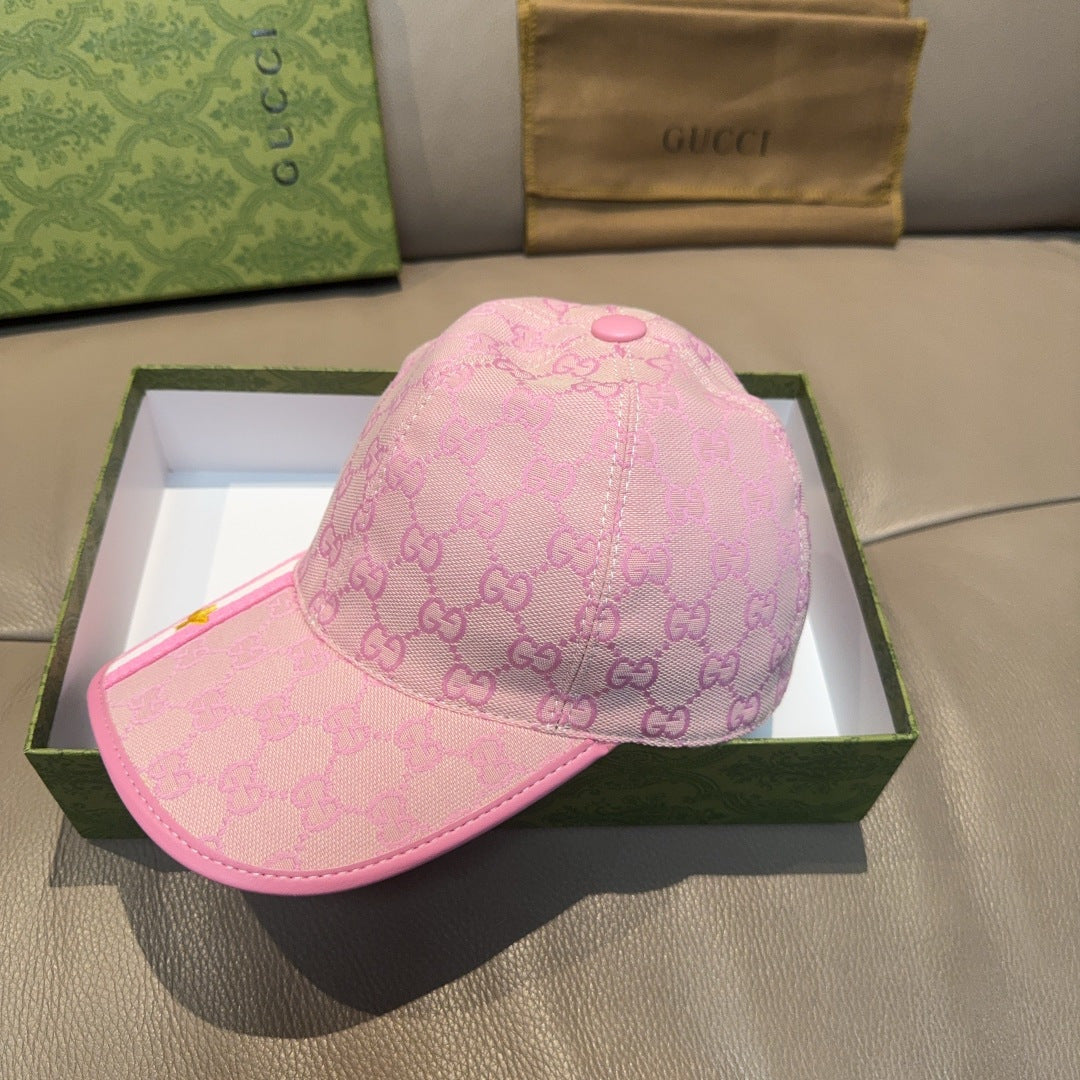 Gucci pink GG monogram cap with small round top button and pink brim
