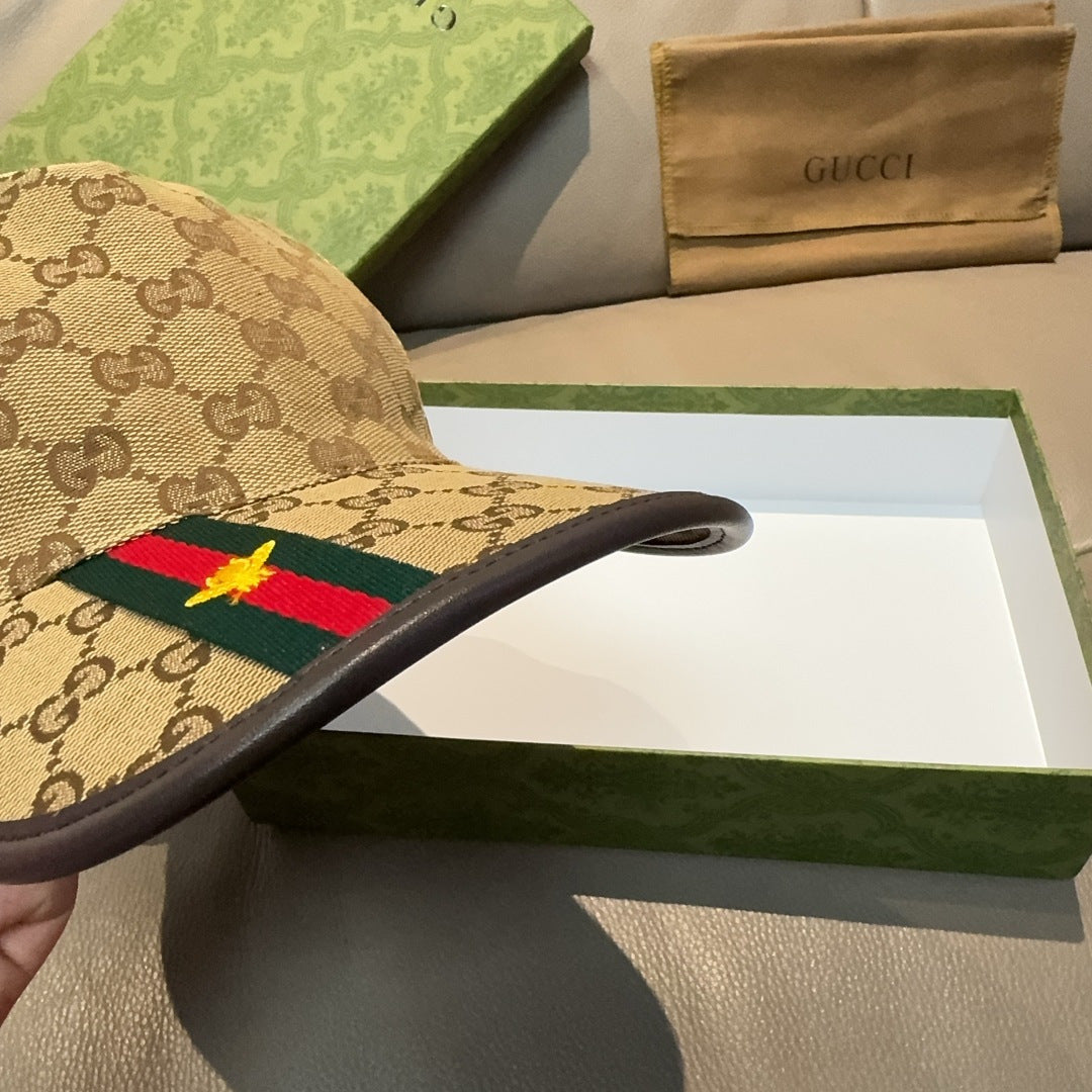 Gucci tan baseball cap side view showing green/red stripe on the brim
