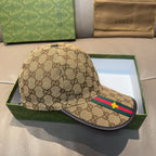 Tan Gucci baseball cap with GG pattern, side stripe in green and red with yellow star