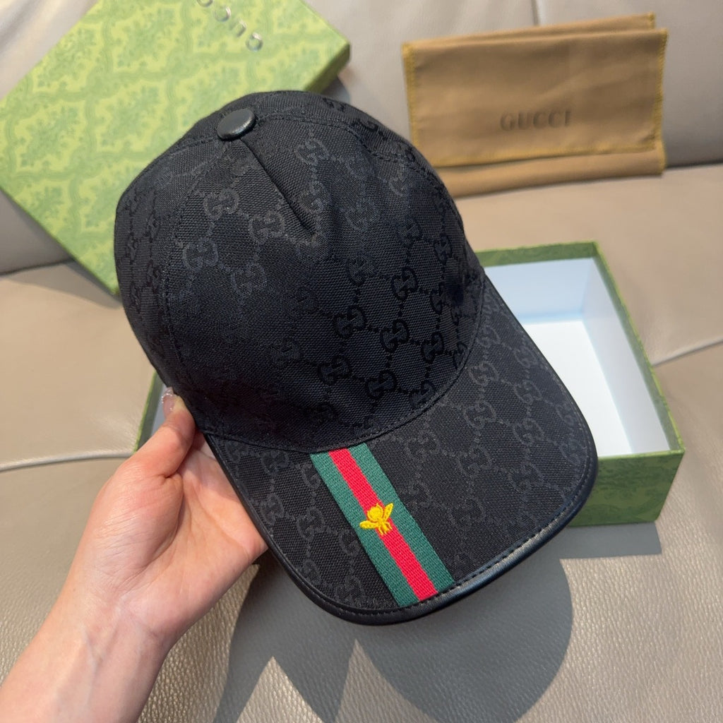 Black Gucci baseball cap with GG jacquard, curved brim, and Web stripe with bee