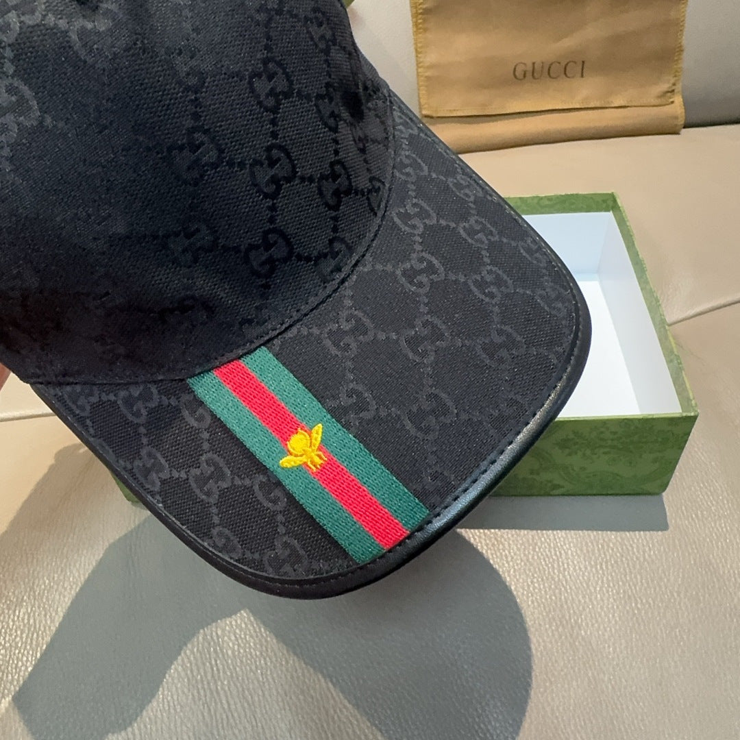 Black Gucci baseball cap side view with Web stripe and gold bee detail