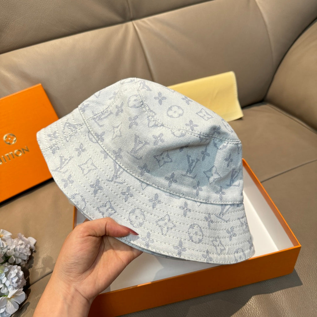 Louis Vuitton bucket cap in light blue with monogram pattern, front side view