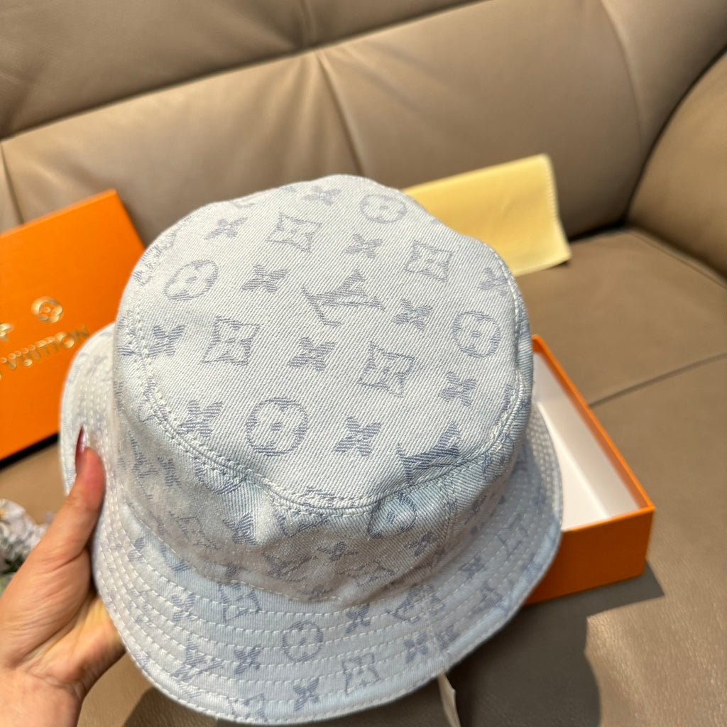 Louis Vuitton bucket cap in light blue with monogram pattern, top view