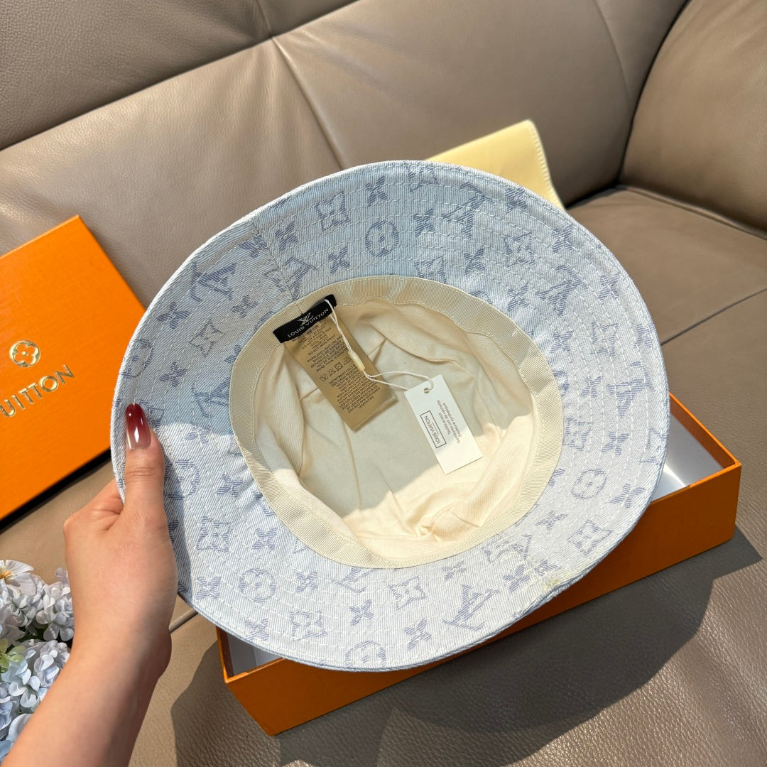 Louis Vuitton bucket cap interior view with monogram exterior, inside lining visible