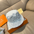 Louis Vuitton bucket cap in light blue with monogram pattern, curved brim