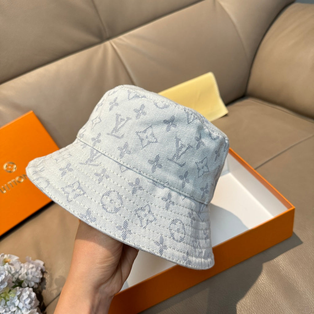 Louis Vuitton bucket cap in light blue with monogram print, wide brim detail