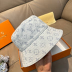 Louis Vuitton bucket cap in light blue with monogram pattern, side view
