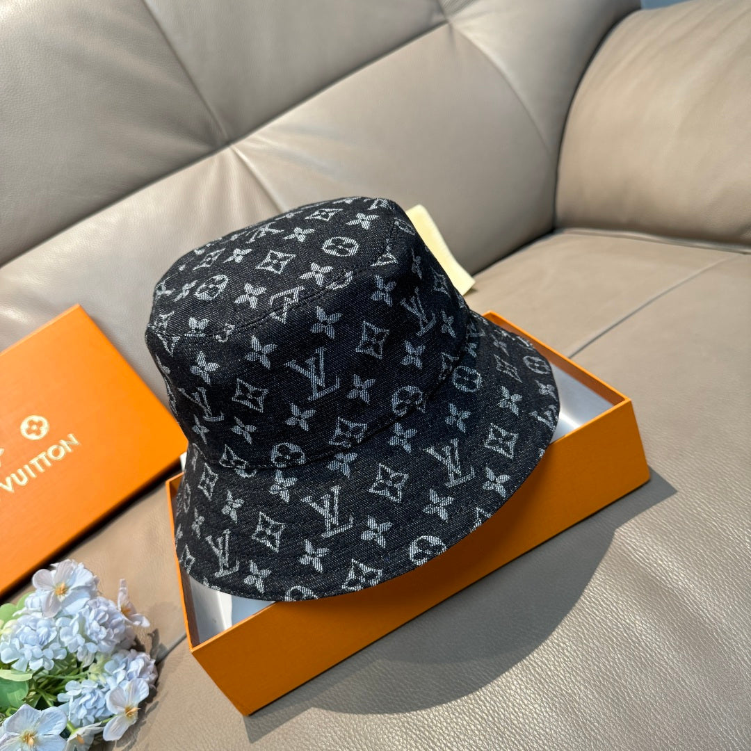 Louis Vuitton bucket hat in dark monogram print, curved brim, front view.
