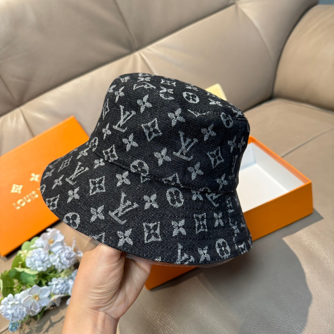 Louis Vuitton bucket hat with dark monogram pattern, side view, curved brim.