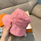 Louis Vuitton pink monogram bucket hat, side view with stitched panels