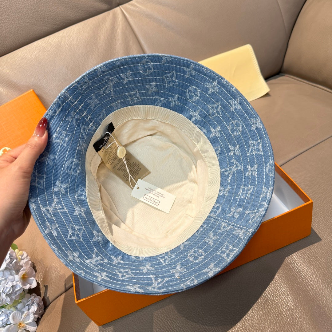 Louis Vuitton blue monogram bucket hat with inner lining and brim edge visible