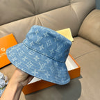 Louis Vuitton blue monogram bucket hat, side view with curved brim