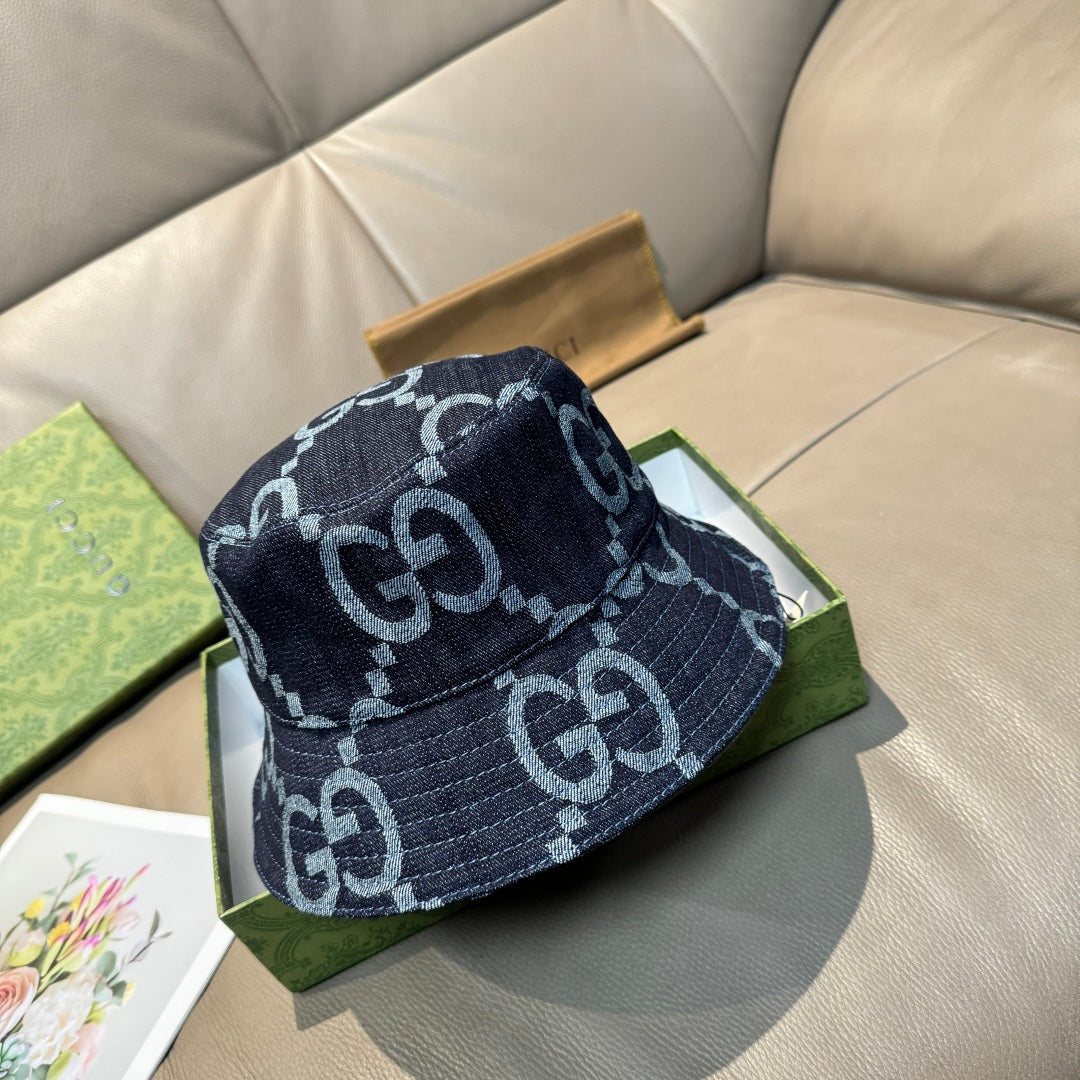 Gucci cap in dark blue denim with white GG monogram pattern and stitched brim