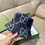 Gucci cap in dark blue denim with white GG monogram pattern, front view