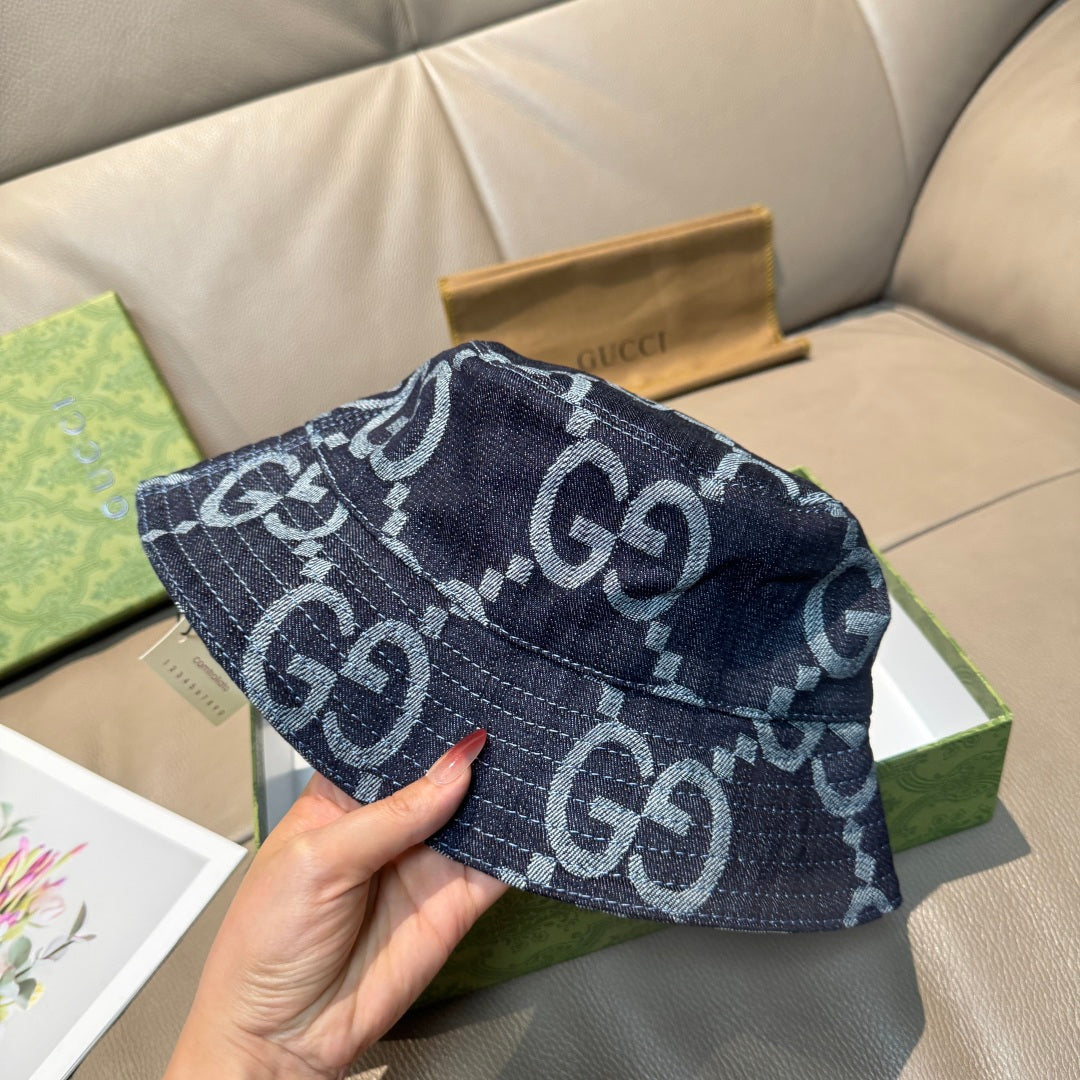Gucci cap with dark blue denim look and white GG monogram pattern, side angle