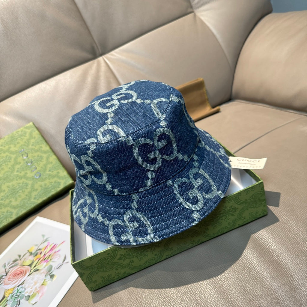 Denim bucket hat with GG monogram pattern, blue side view with curved brim