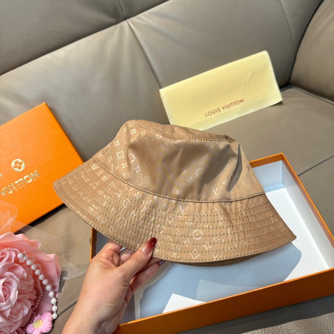 Louis Vuitton bucket hat beige monogram canvas, front view with stitched brim