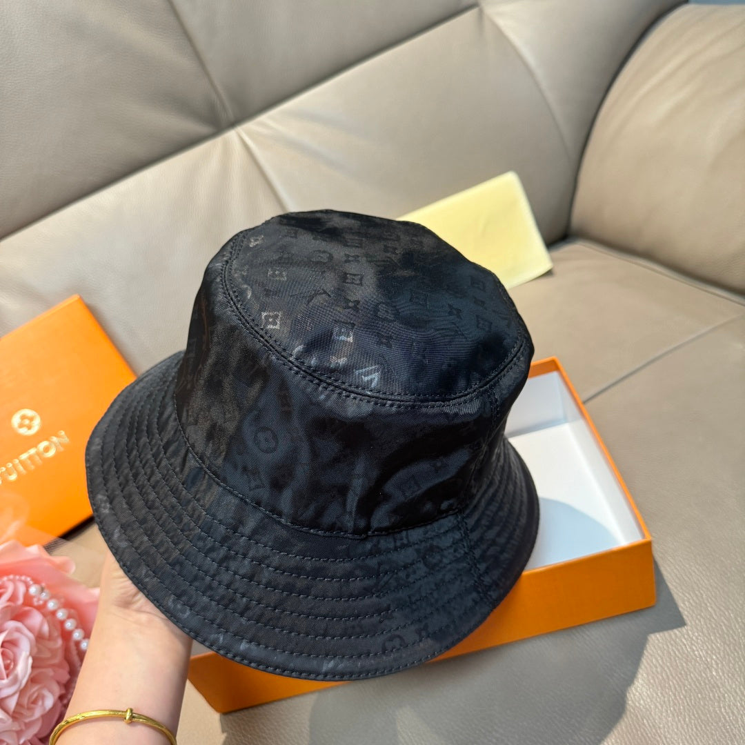 Louis Vuitton monogram bucket hat, dark blue, back view with stitched panels