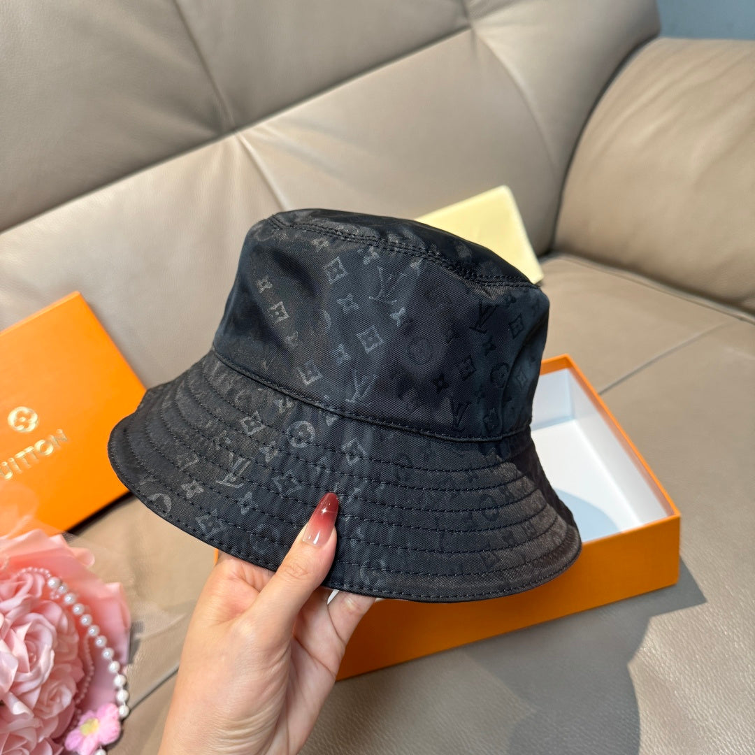 Louis Vuitton monogram bucket hat, dark blue denim look, wide brim, stitched band