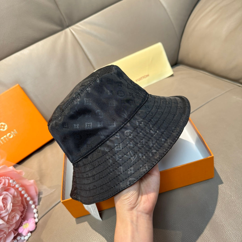 Louis Vuitton monogram bucket hat, dark blue, side view with quilted brim