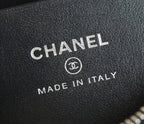 Chanel logo and 'Made in Italy' stamp on black leather