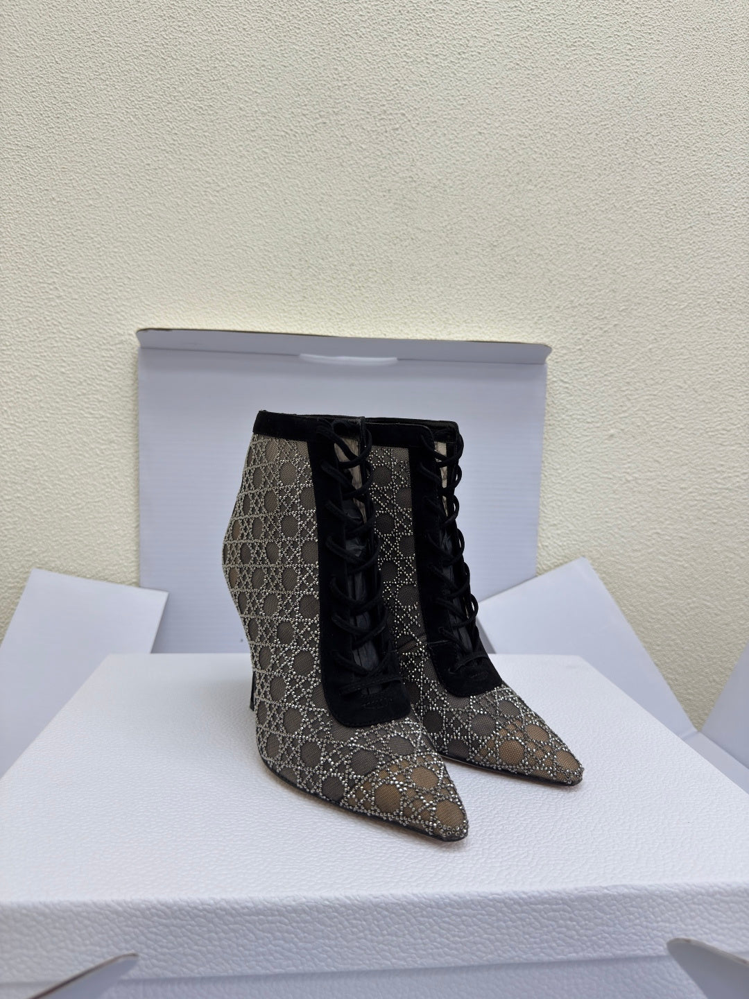 Women’s lace-up ankle boots with monogram upper, pointed toe, stiletto heel