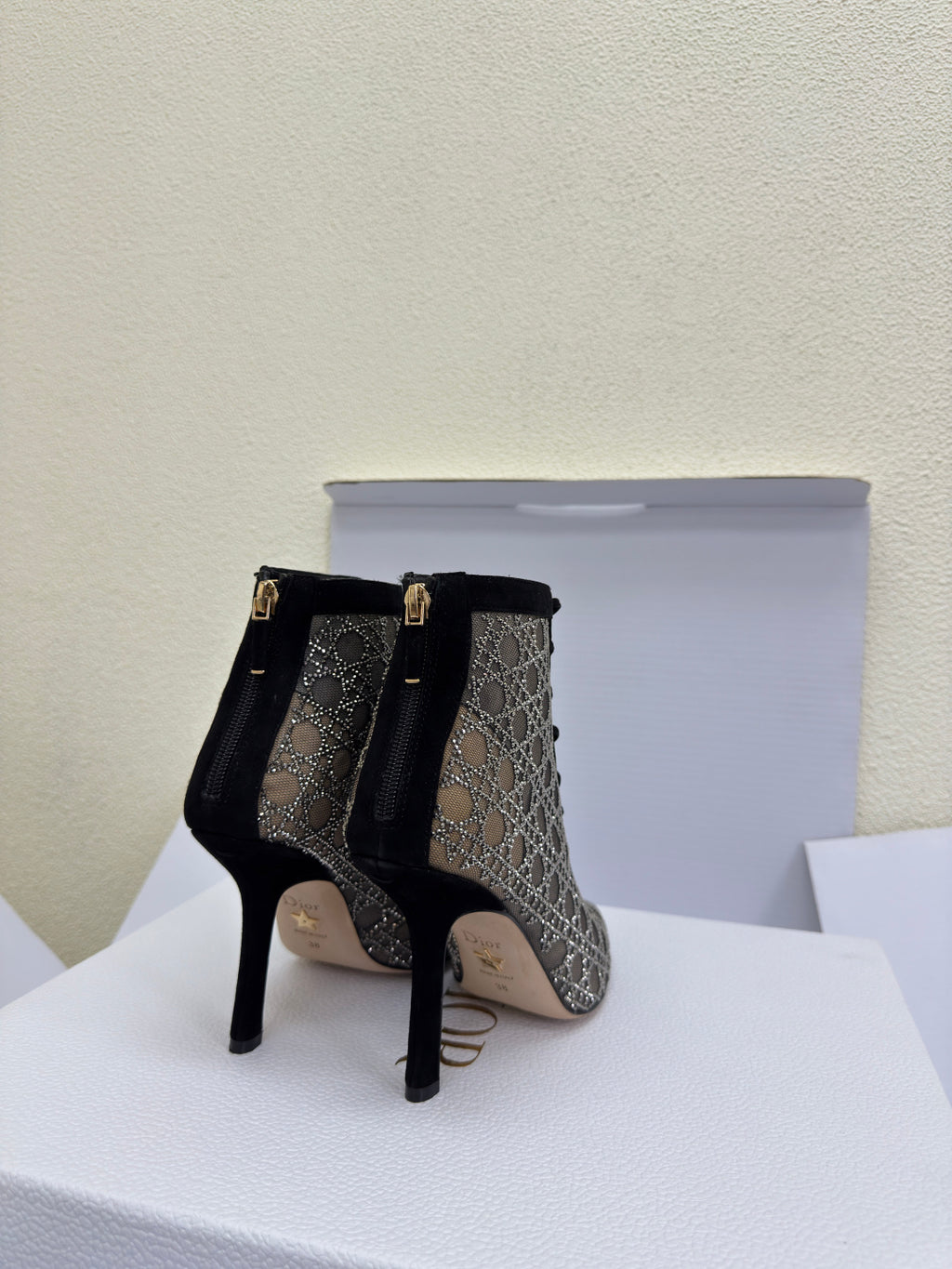 Women’s lace-up ankle boots with monogram print, back view, stiletto heel