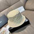 Dior bucket cap in light tan with allover monogram pattern