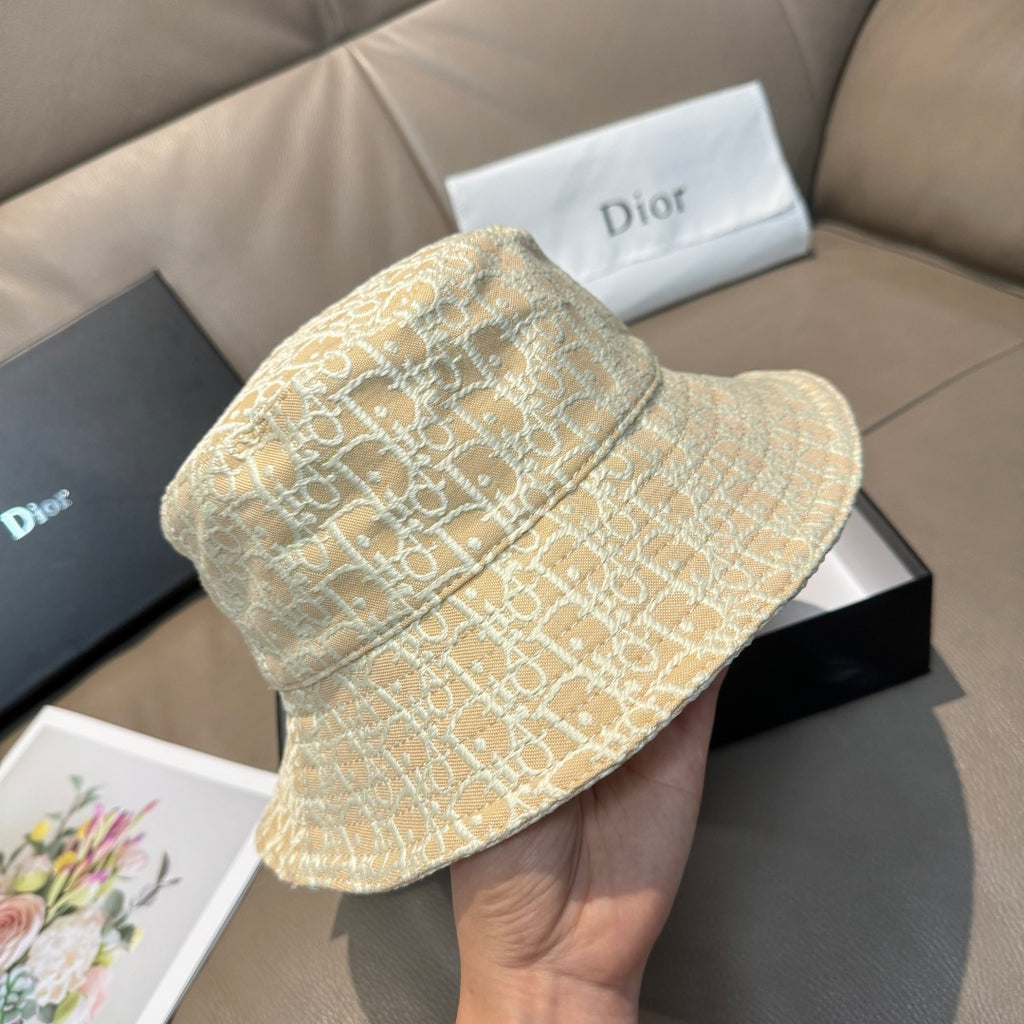 Dior bucket cap in light tan monogram pattern with structured wide brim