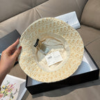 Dior bucket cap in light tan monogram with beige inner lining visible