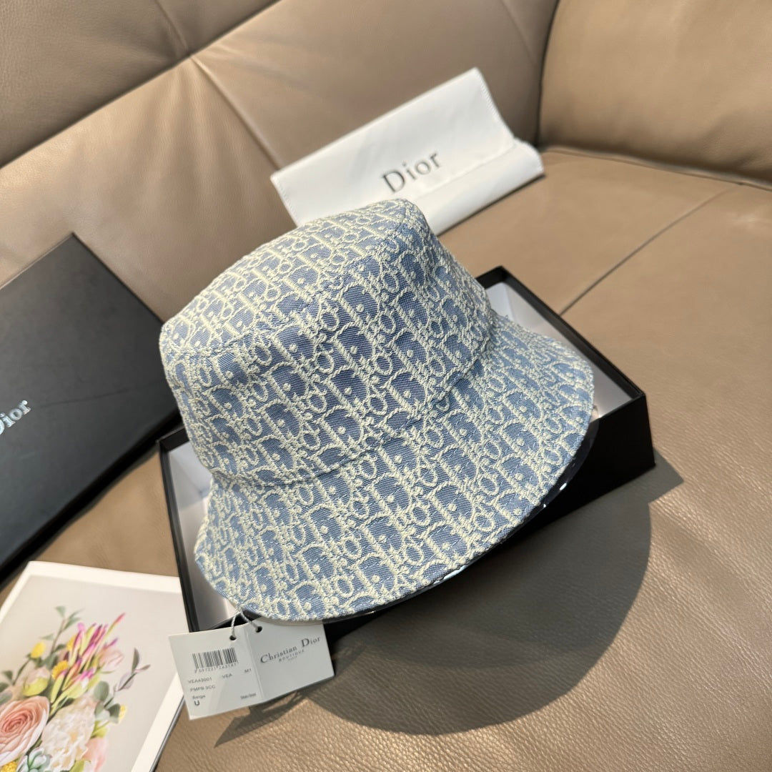 Dior bucket hat in light blue with repeating Dior pattern, side view
