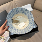 Dior bucket hat in light blue; underside view showing inner label