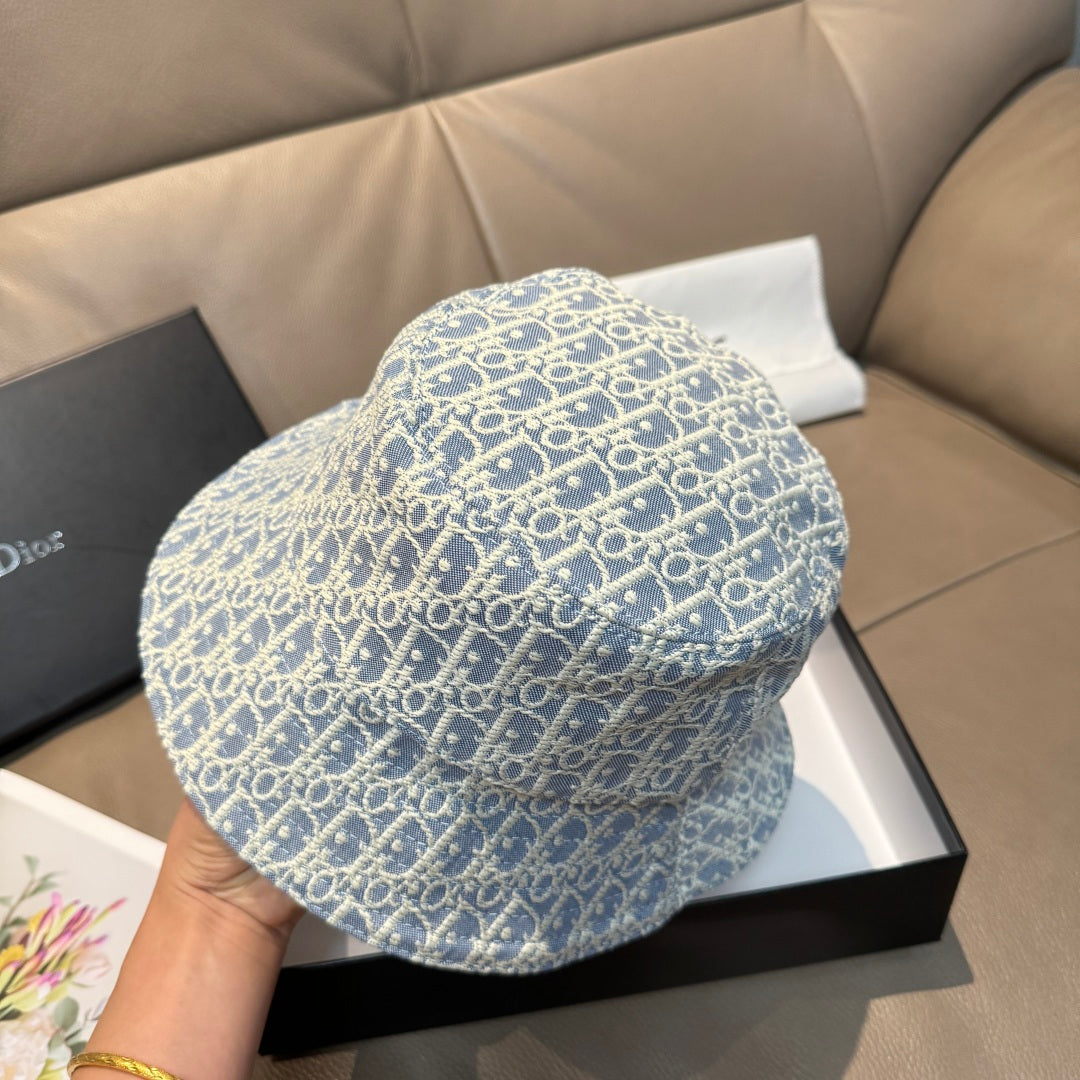 Dior bucket hat in light blue with repeating Dior monogram, front view