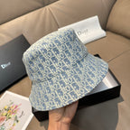 Dior bucket hat in light blue with Dior monogram pattern, angled view