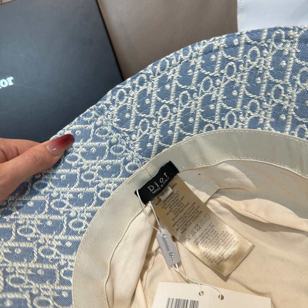 Dior bucket hat in light blue with Dior monogram; interior brim and label