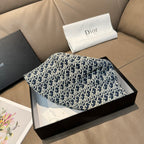 Monogram bucket cap in navy with white pattern, in box with Dior dust bag