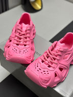 Balenciaga pink lace-up chunky sandals close-up, textured upper with perforations