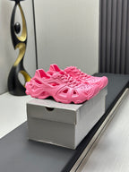 Balenciaga pink lace-up chunky sandals on box, side view with thick platform sole