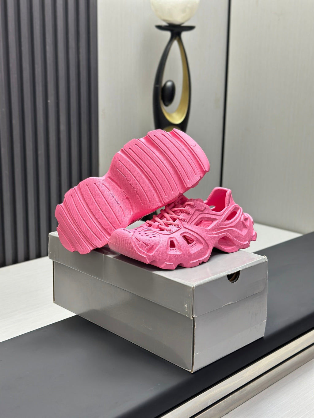 Balenciaga pink chunky sandals with ribbed sole underside on display box
