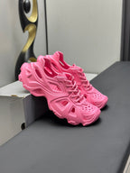 Balenciaga pink lace-up chunky sandals with layered sole detail, side view