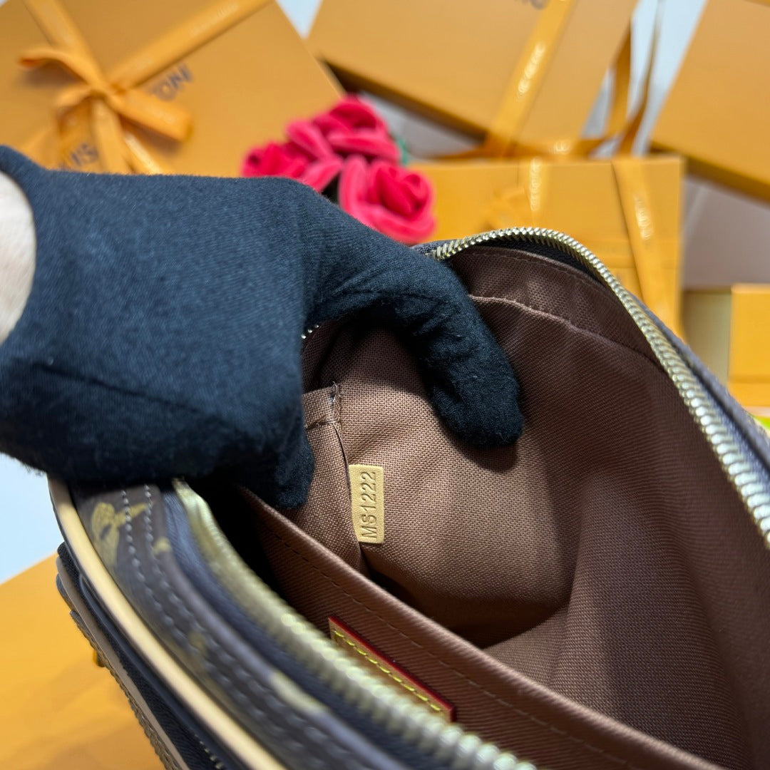 Monogram mini crossbody bag interior lining with center brand patch tag.