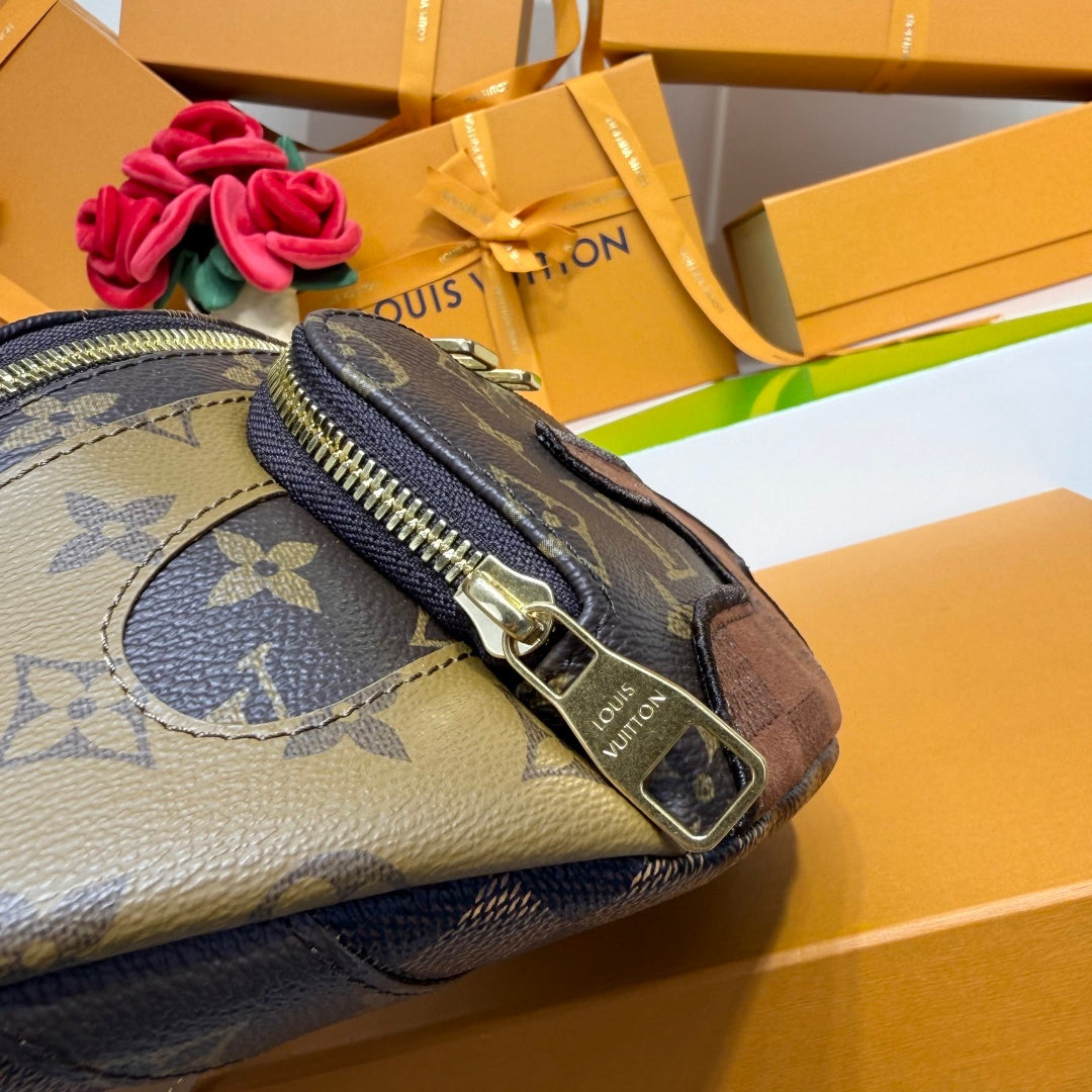 Louis Vuitton monogram belt bag close-up on zipper end with gold-toned zipper pull