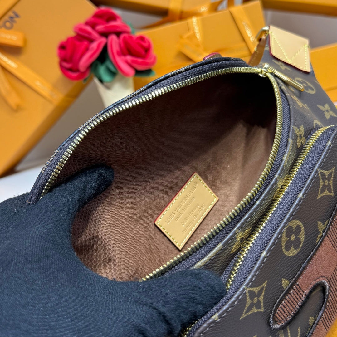 Louis Vuitton belt bag interior with beige lining, gold zipper, and brand label patch, dark blue.