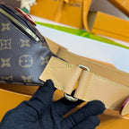 Louis Vuitton monogram belt bag strap buckle with pale leather and gold-tone hardware, dark blue.