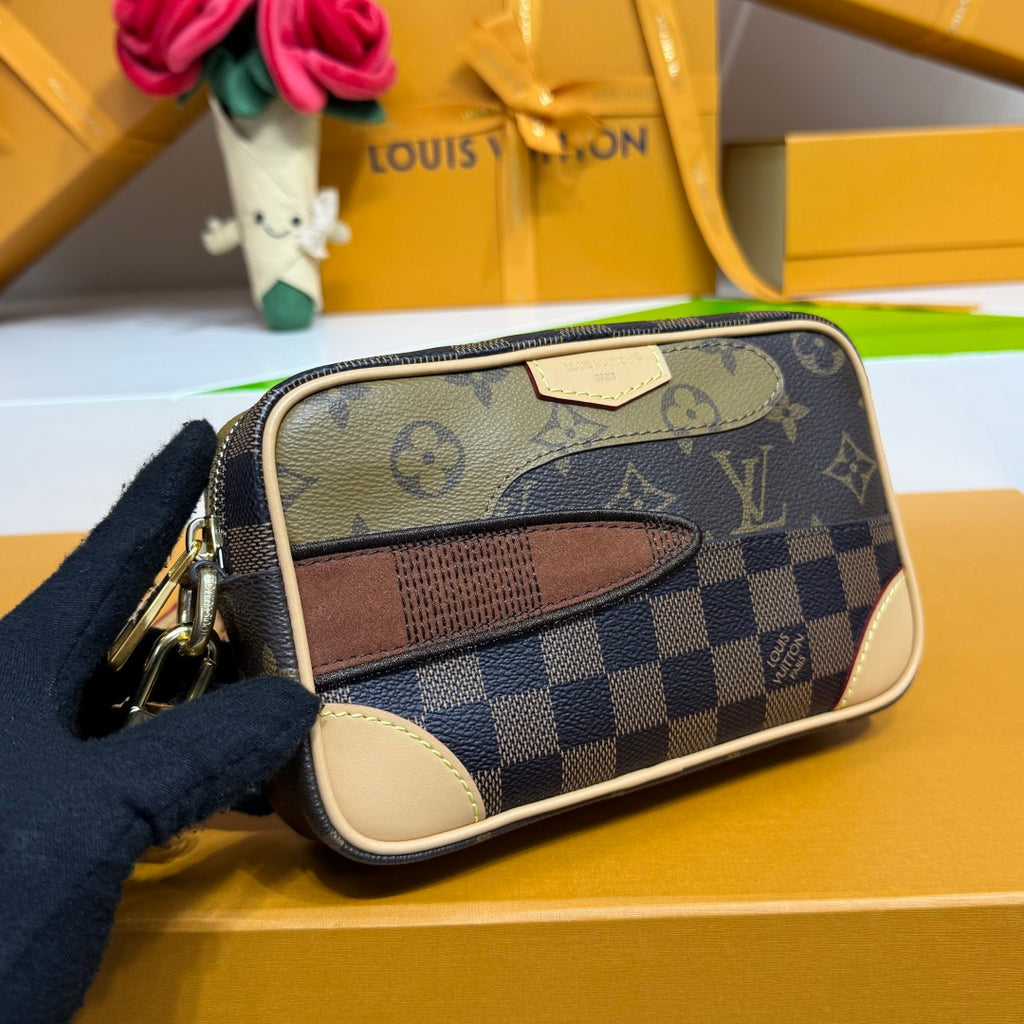 Louis Vuitton monogram crossbody bag, close-up of front pocket and beige edge trim