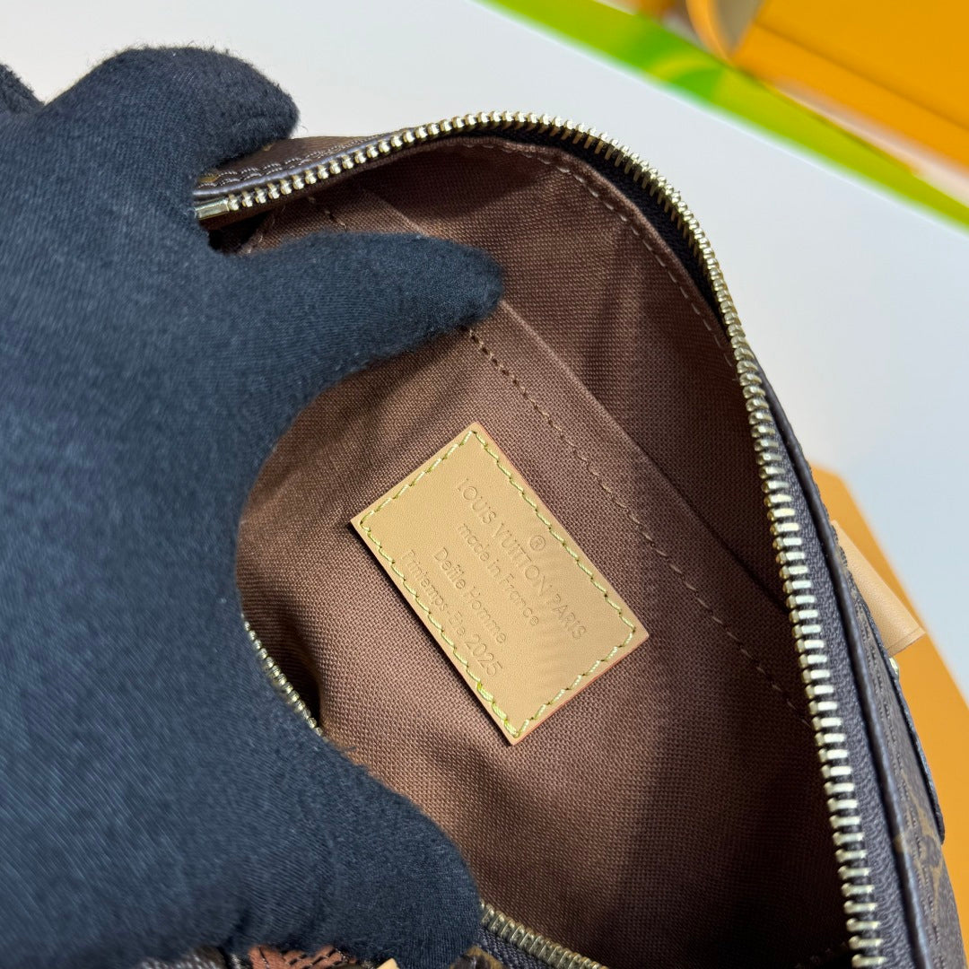 Louis Vuitton mini bag interior pocket with beige leather label and zipper opening