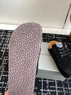 Balenciaga dark suede lace-up shoes, textured rubber outsole close-up